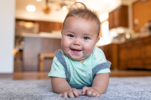 Baby laying on carpet flooring | Bowlings Flooring